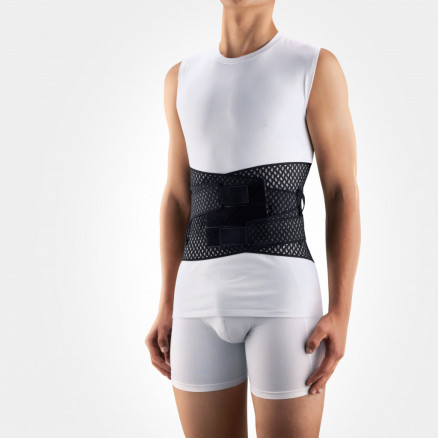 Corset de fixation lombaire élastique médicale à partir de matériaux respirables et durables avec inserts et sangles rigides pour réguler la compression. AIR